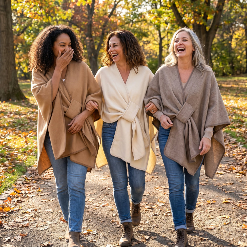 Three friends wearing the Aspen shawl